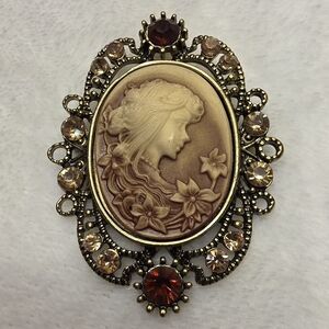Elegant Floral Cameo Brooch with Brown and Gold Details